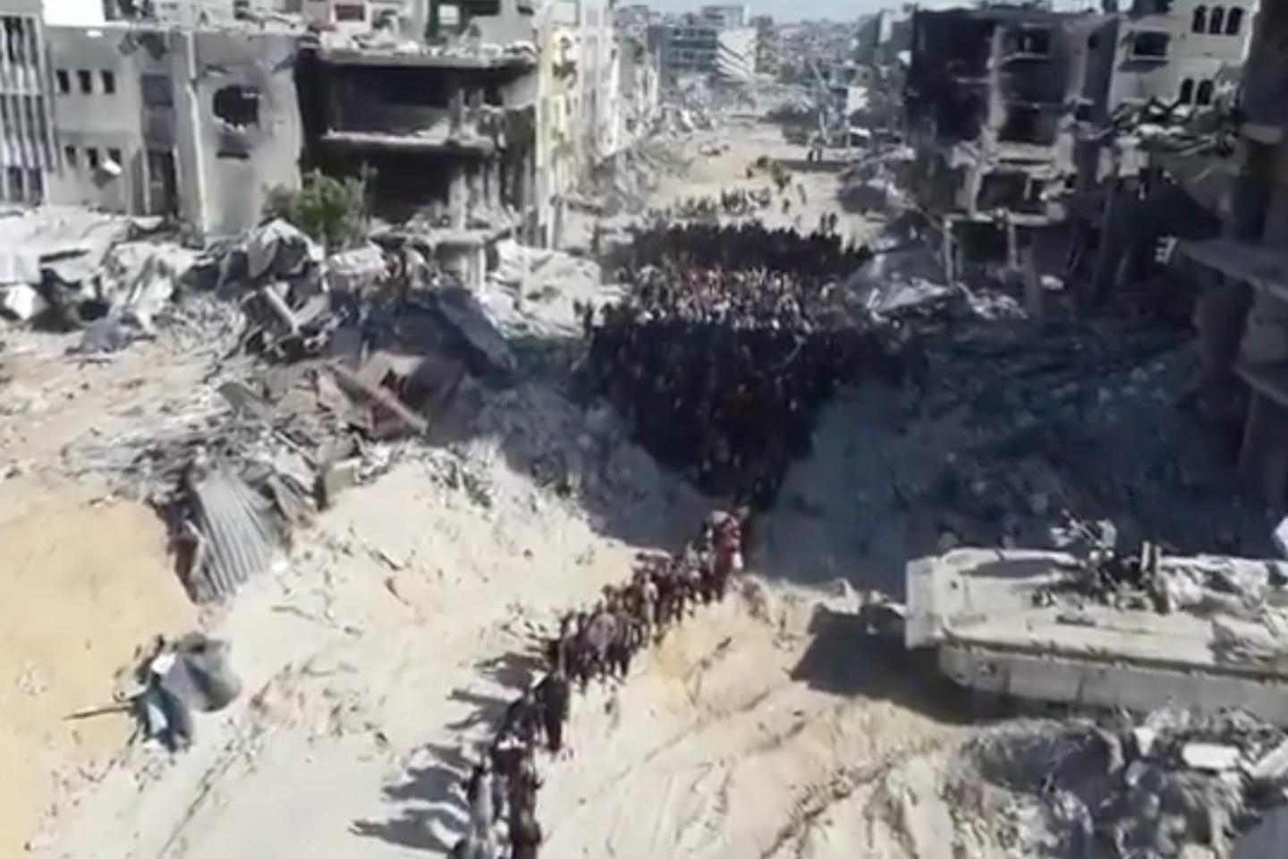 In Gaza, survivors flee from Jabalia refugee camp