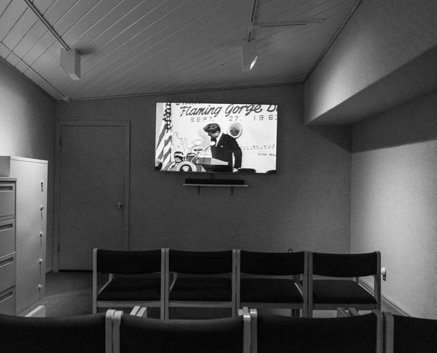 The inauguration of Flaming Gorge Dam by John F. Kennedy, in a historical film shown in a room at the Red Canyon Visitor Center, in Utah in 2022.