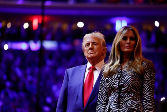 Republican presidential nominee, former US President Donald Trump and Melania Trump take the stage at the campaign rally at Madison Square Garden on October 27, 2024 in New York City.