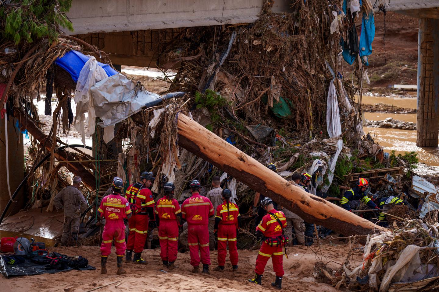 Spain sends 10,000 more troops to flood-hit region, as death toll soars to at least 211