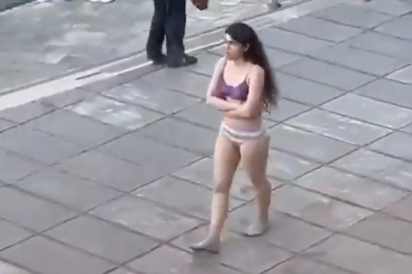 Video. Iranian woman arrested after stripping in protest ...