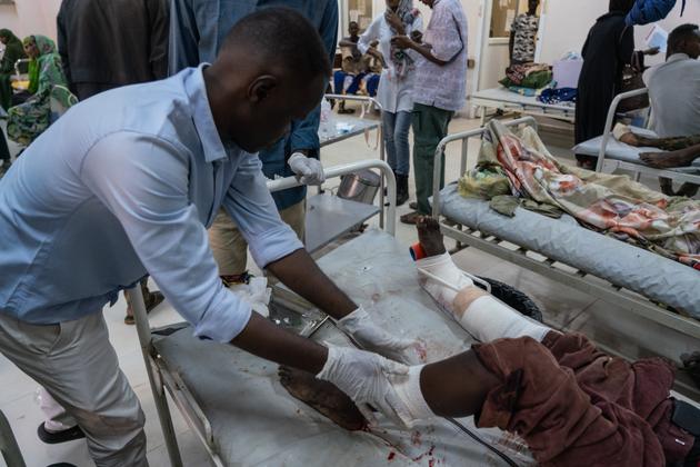 Hamid Al-Nazir, 13, wounded by mortar fire, in the emergency room of Al-Naw hospital, Omdurman, Sudan, October 26, 2024.
