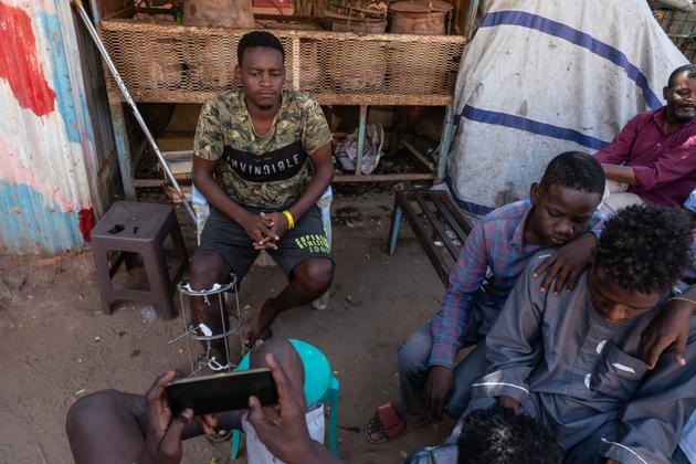Moussa, 20, in a street café opposite Al-Naw Hospital, Omdurman, Sudan, October 26, 2024.