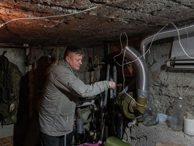 Safonov, in the shelter he built in the basement of his house, where he lived for eight months after the Ukrainian army liberated the town in November 2022. Kherson (Ukraine), November 11, 2024.