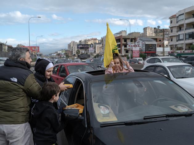 Handing out sweets in traffic jams on the road leading to southern Lebanon, November 27, 2024.