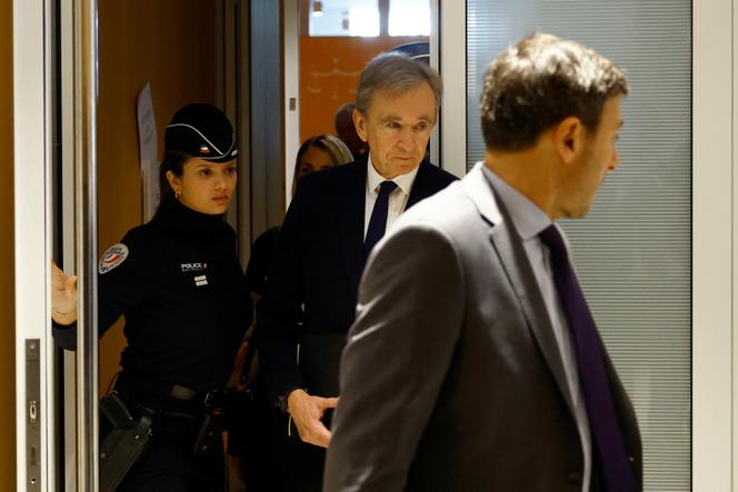 Bernard Arnault, head of LVMH, leaves a Paris courthouse on November 28, 2024.