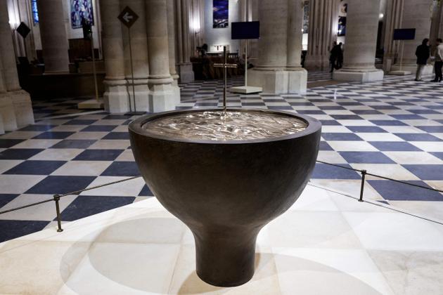This photograph shows the baptistery designed by French artist and designer Guillaume Bardet of Notre-Dame de Paris cathedral in Paris, on November 29, 2024.