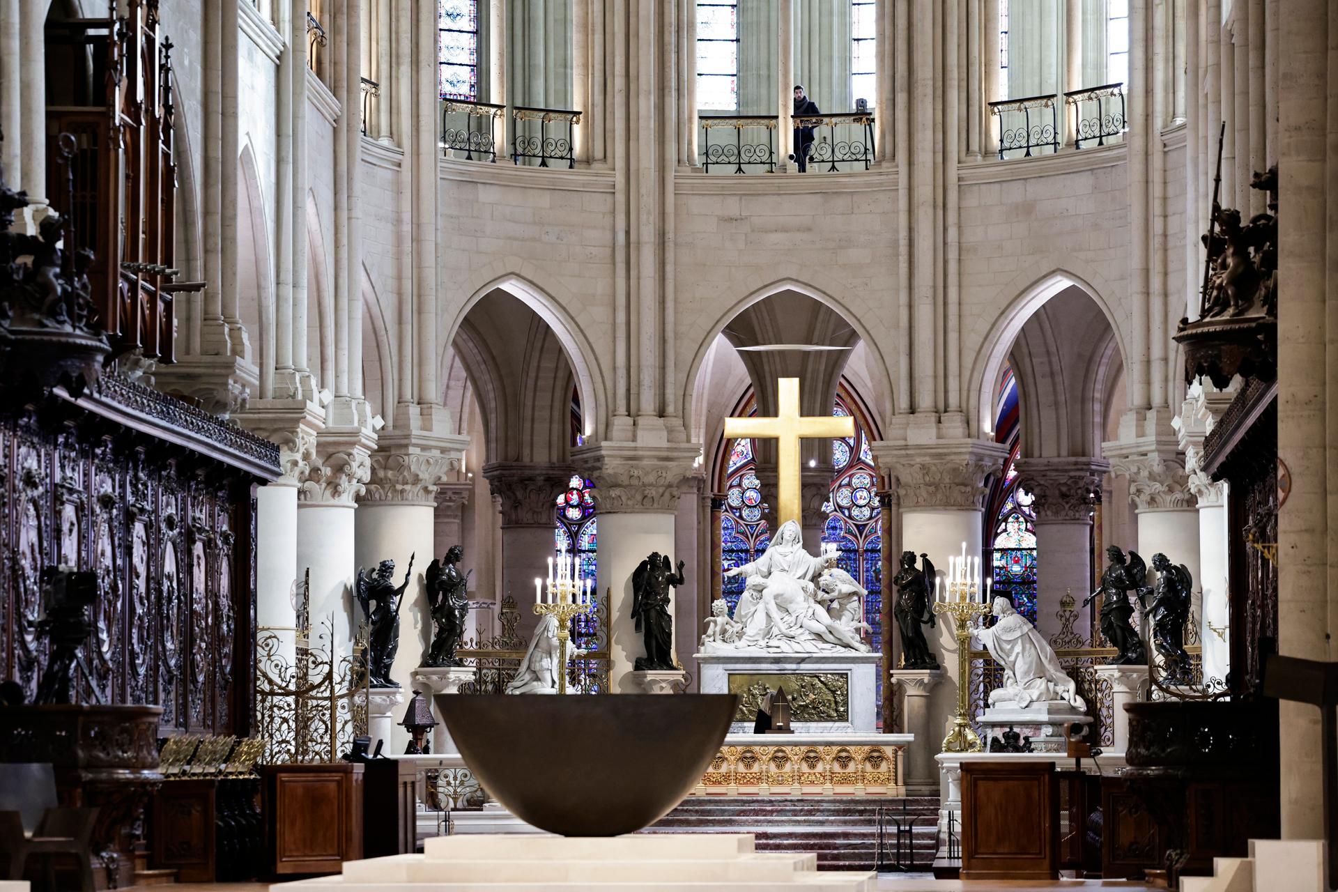 The altar, designed by French artist and designer Guillaume Bardet, is seen in the heart of Notre-Dame de Paris cathedral while French President Emmanuel Macron visits the restored interior of the monument, in Paris, on Friday, November 29, 2024.