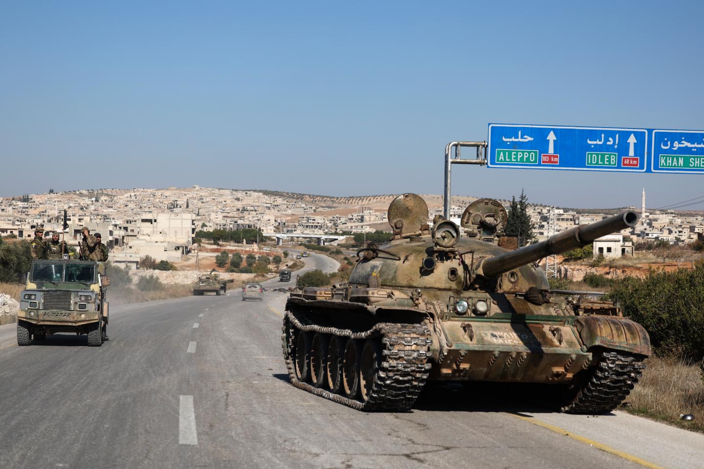 Syria launches counterattacks in an attempt to halt insurgency, as Iran's top diplomat meets Assad