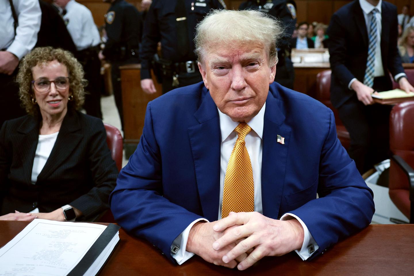 Trump cites Hunter Biden pardon in seeking hush money case dismissal