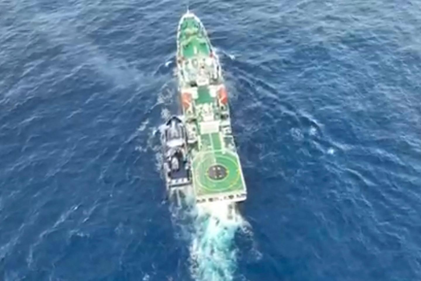 Philippines says China Coast Guard fired water cannon, 'sideswiped' government vessel