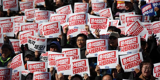 South Korean lawmakers thwart president's attempted coup de force