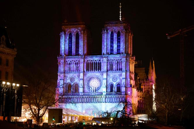 This photograph shows Notre-Dame de Paris Cathedral illuminated on the eve of its official reopening, after more than five-years of reconstruction work following the April 2019 fire, in Paris on December 6, 2024.