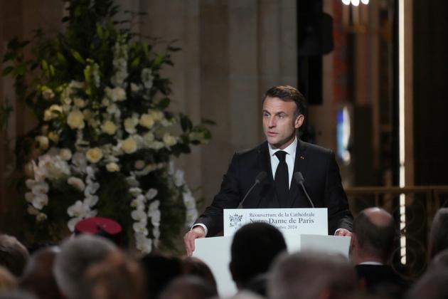 French President Emmanuel Macron speaks in Notre-Dame Cathedral.