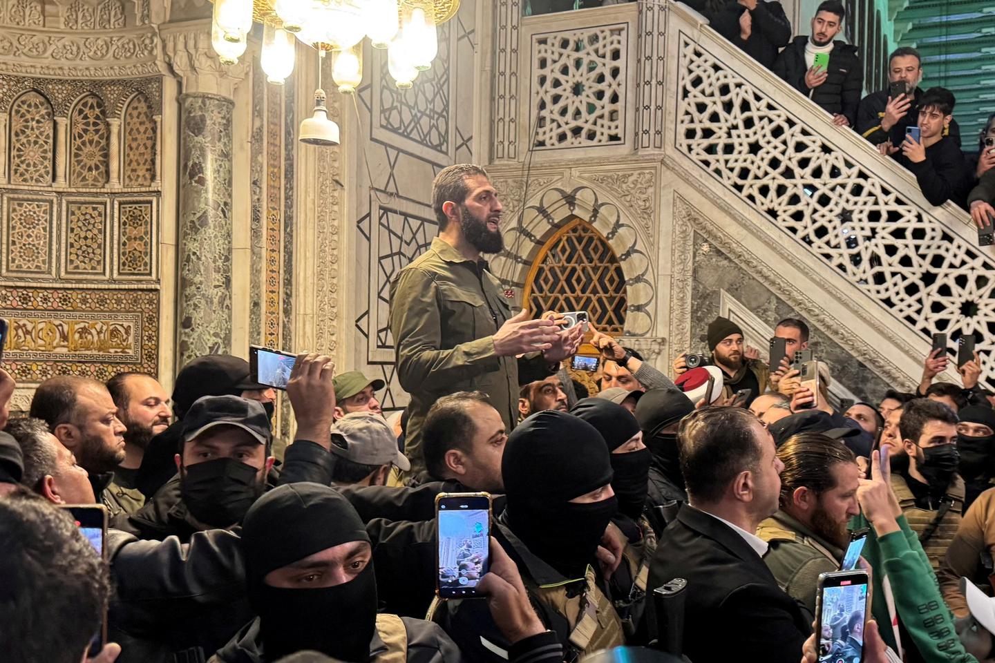New Syria PM says will 'guarantee' all religious groups' rights