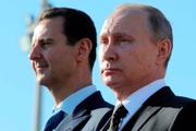 Les présidents syrien et russe, Bachar Al-Assad et Vladimir Poutine, le 11 décembre 2017 à Hmeimim (Syrie).