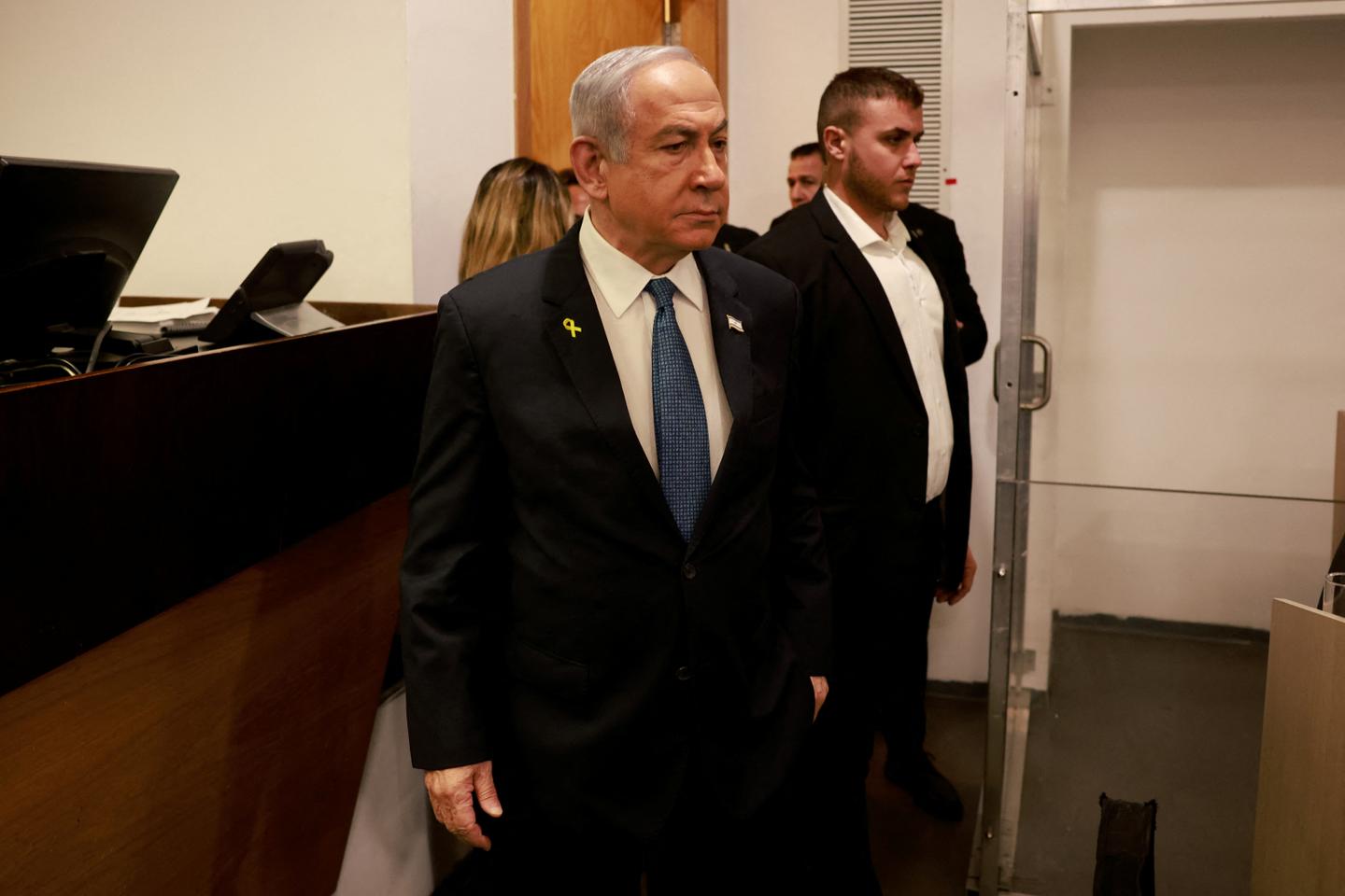 Defiant Netanyahu makes first appearance before Israeli courts at corruption trial