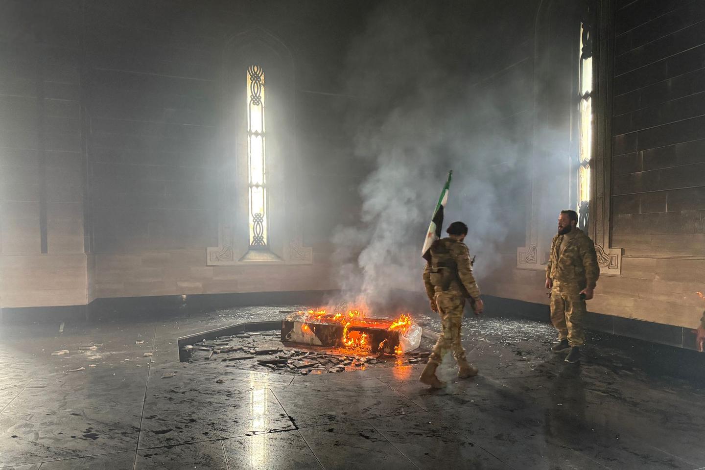 Syrian rebels set Hafez al-Assad's tomb on fire