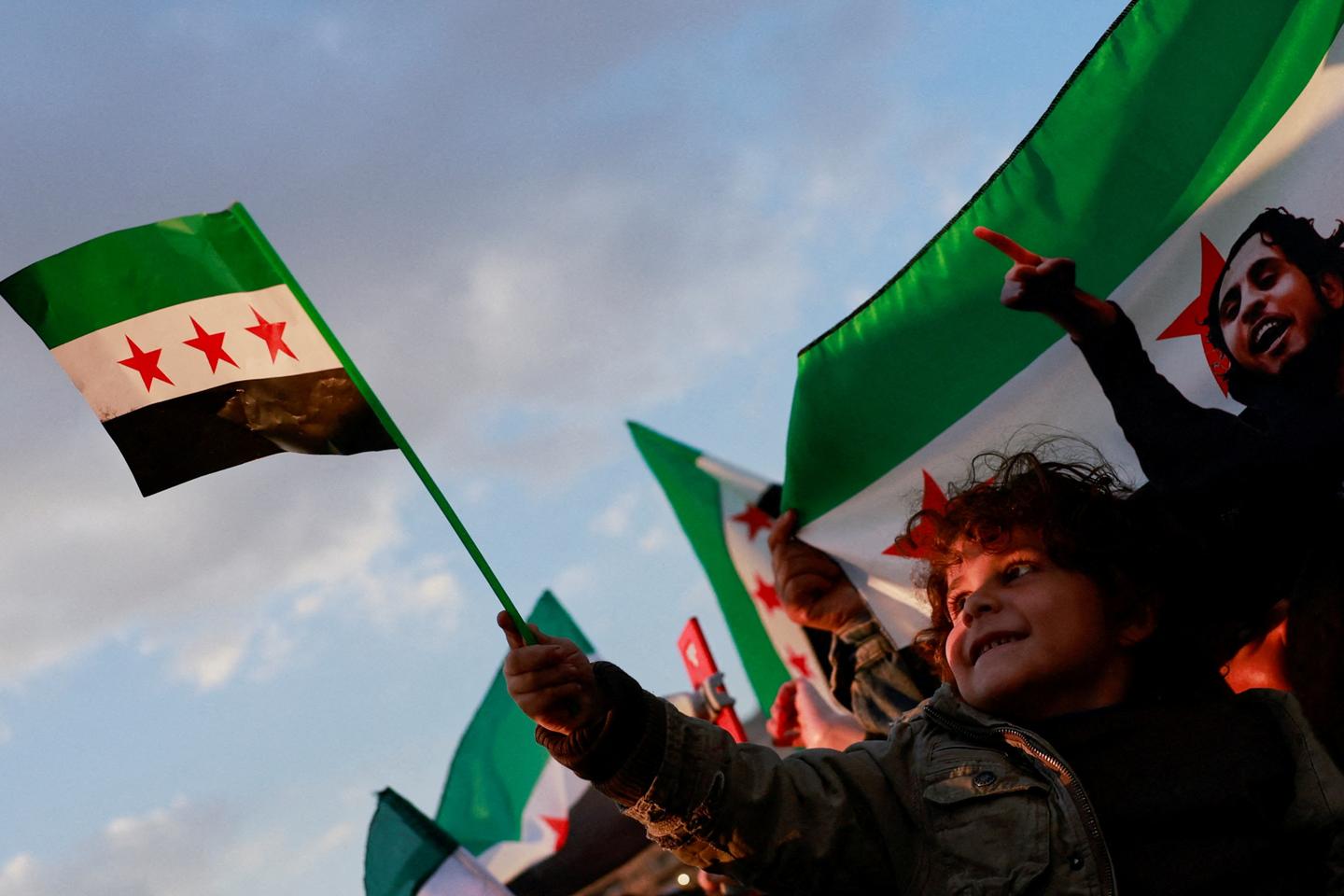 New Syrian leaders say they want to contribute to 'regional peace'
