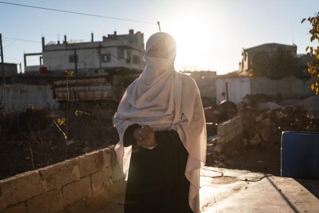 Nazeeha Hassoun, a resident of the Druze village of Hadar (Syria), earns her living selling bread. December 19, 2024.