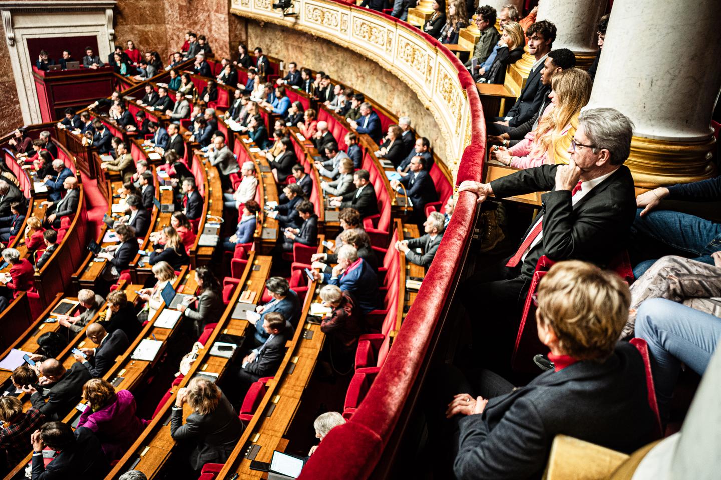 A year of crisis in French Parliament, in photos