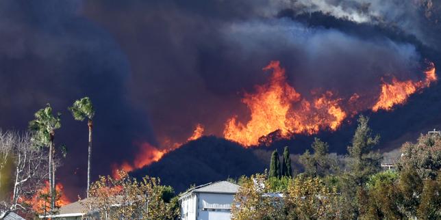 Los Angeles residents flee fire as potentially 'life-threatening, destructive' winds gain strength