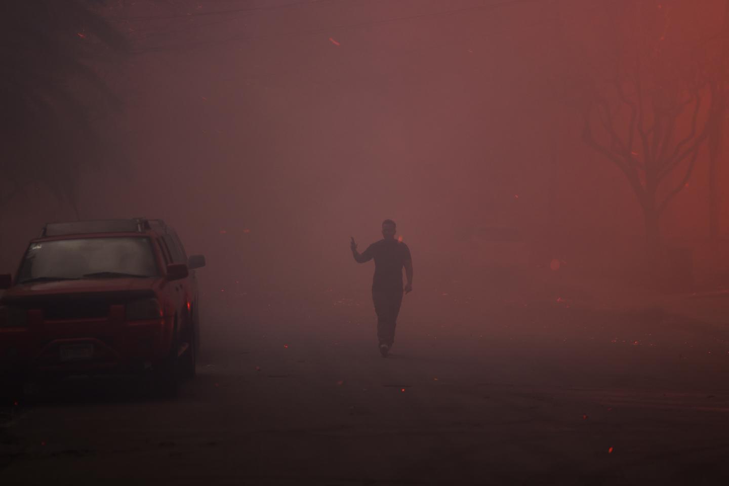 Two dead and more than 1,000 structures destroyed in LA wildfires