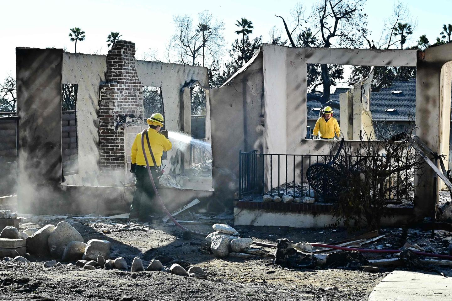 In Los Angeles, firefighters battle the 'crazy' wind fanning the flames