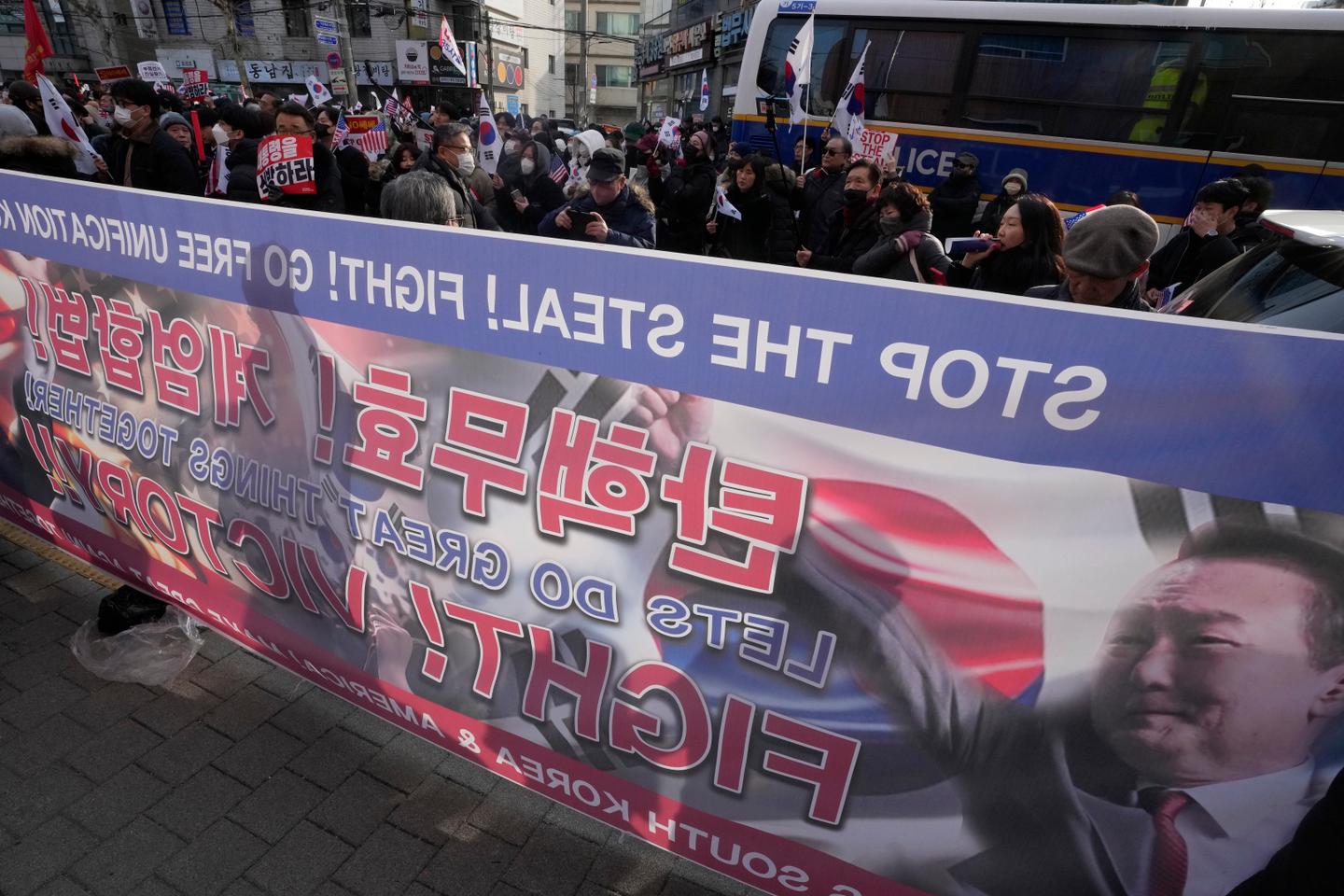 South Korea's president goes on trial as investigators seek to extend detention