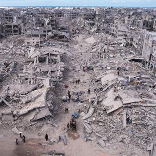 An aerial photograph taken by a drone shows displaced Palestinians returning to Rafah, a day after the ceasefire deal between Israel and Hamas came into effect, Gaza Strip, Monday, Jan. 20, 2025. (AP Photo/Mohammad Abu Samra)
