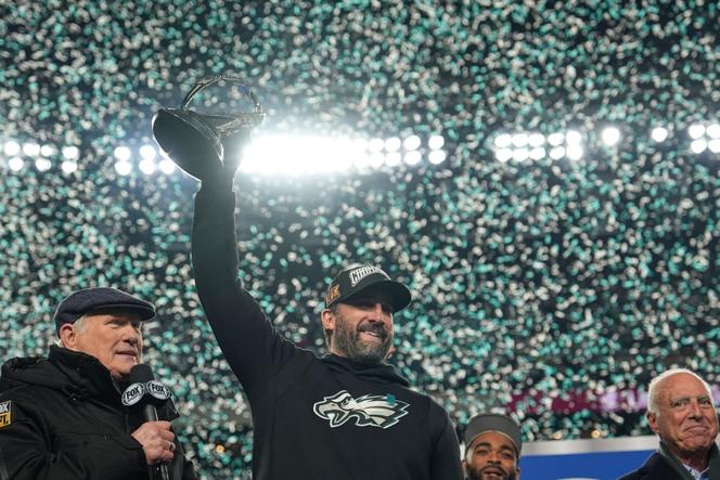 Philadelphia Eagles coach Nick Sirianni holds up the championship trophy after the Eagles won the NFC Championship NFL football game against the Washington Commanders, on Jan. 26, 2025, in Philadelphia.