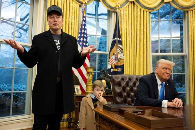 Elon Musk speaks as his son X Æ A-Xii and US President Donald Trump look on in the Oval Office of the White House in Washington, DC, on February 11, 2025.
