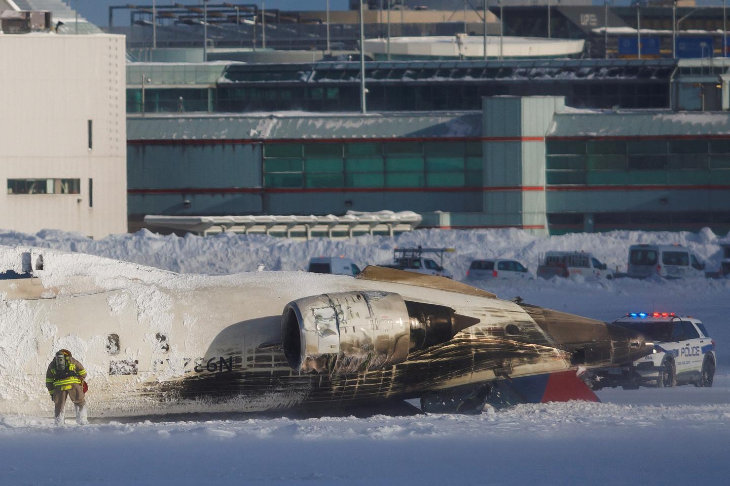 Delta plane flips upside down in Toronto crash, at least 8 wounded