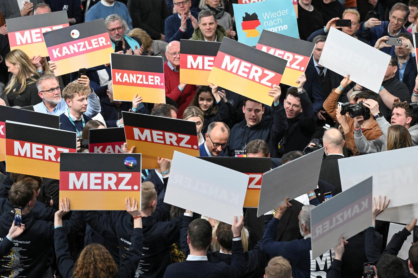 Germany's Merz vows tough migrant policy to stall AfD's rise