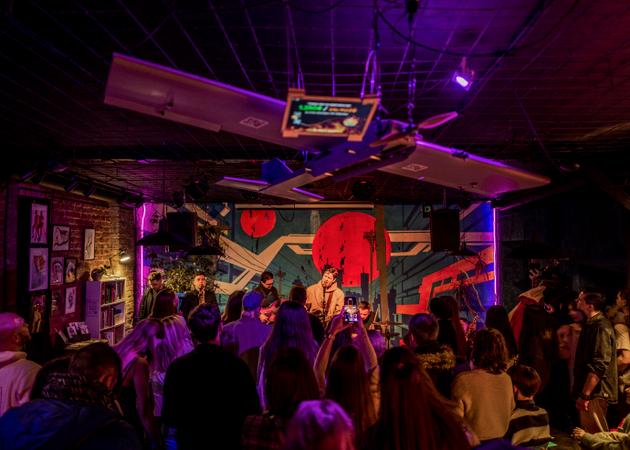 A band from the X collective performs at a benefit to fund a drone at Squat 17b, Kyiv, February 19, 2025.