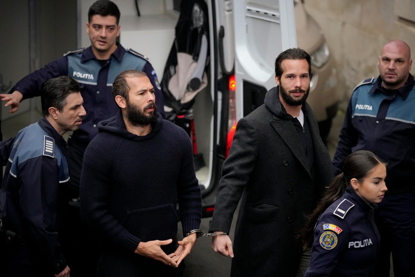 Andrew Tate, facing human trafficking charges in Romania, leaves for US