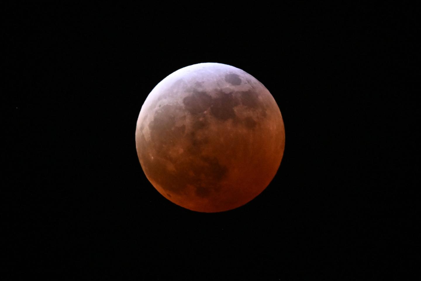 Stargazers enjoy dramatic 'Blood Moon', a total lunar eclipse