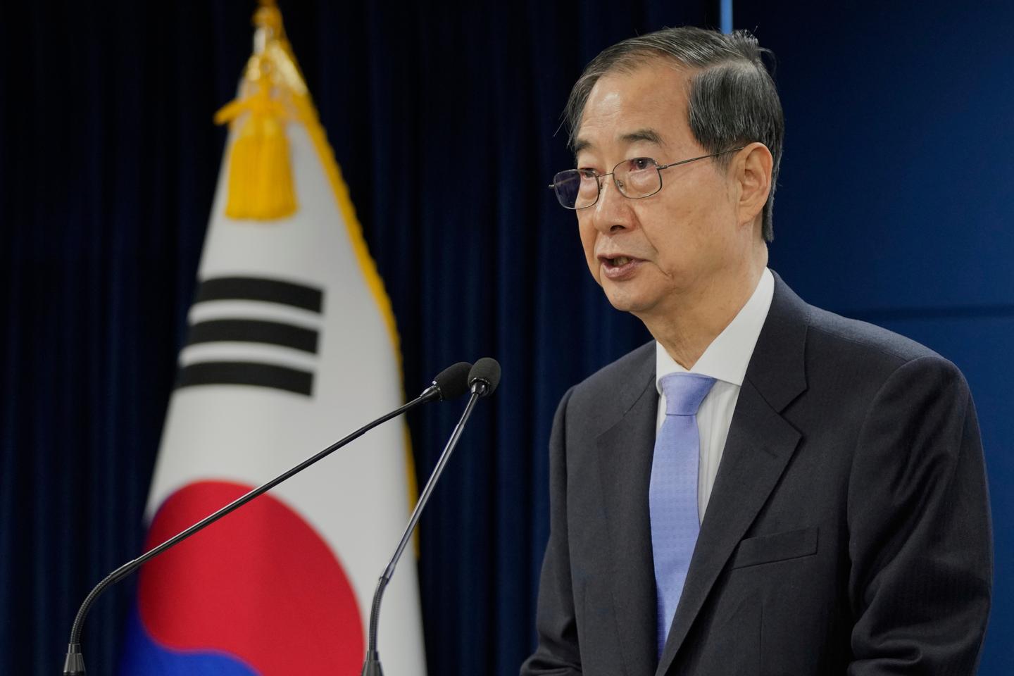 South Korea's top court reinstates PM Han as acting president