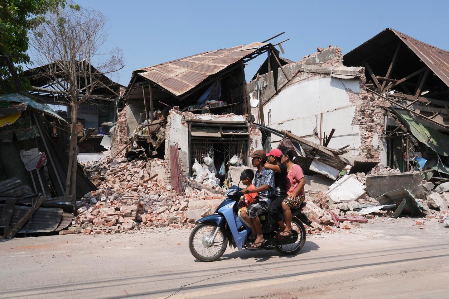 Smell of death permeates Myanmar cities after quake kills over 1,700 and leaves countless buried