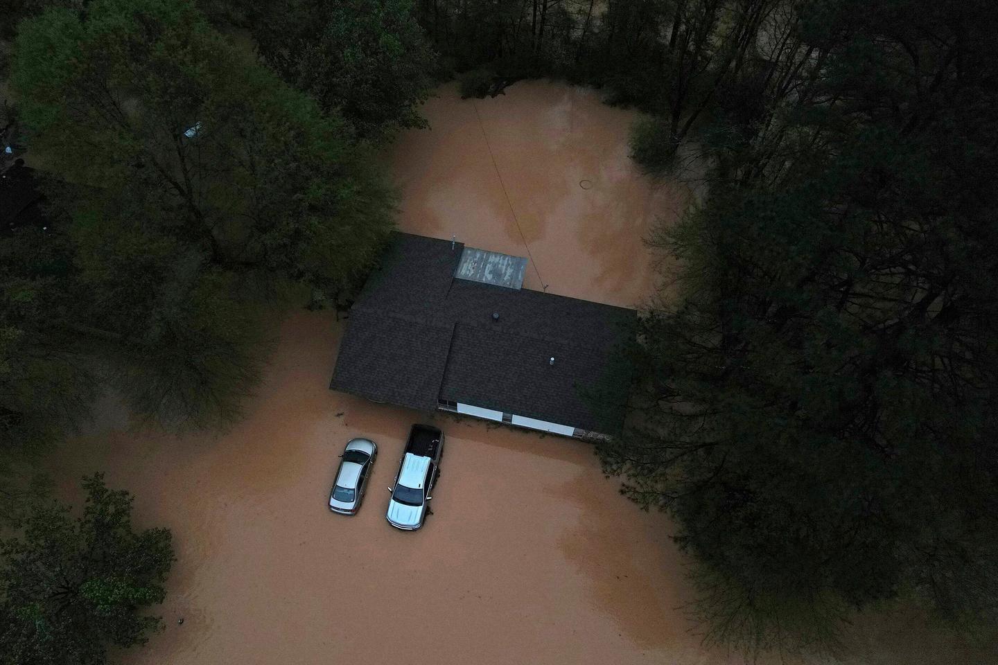 At least 16 dead in flooding and tornadoes as storms slash from Texas to Ohio