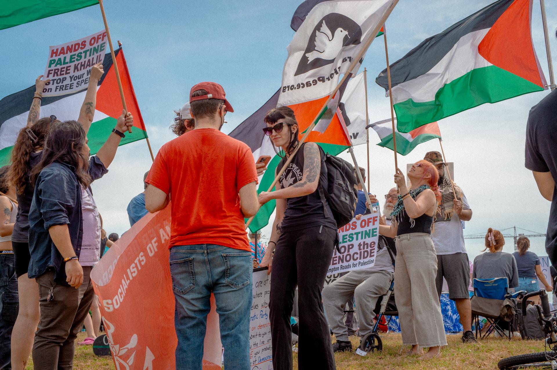 Pro-Palestine protesters join thousands who gathered at Town Point Park in Norfolk, Virginia, to protest the Trump administration on Saturday, April 5, 2025.