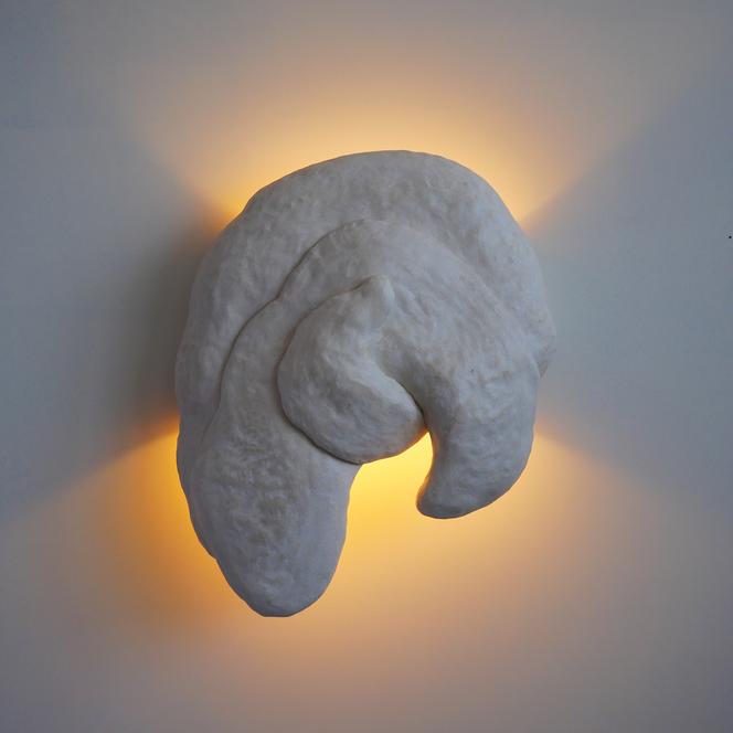 A light fixture from the <em>La Danza</em> collection.”/> </noscript><figcaption class=