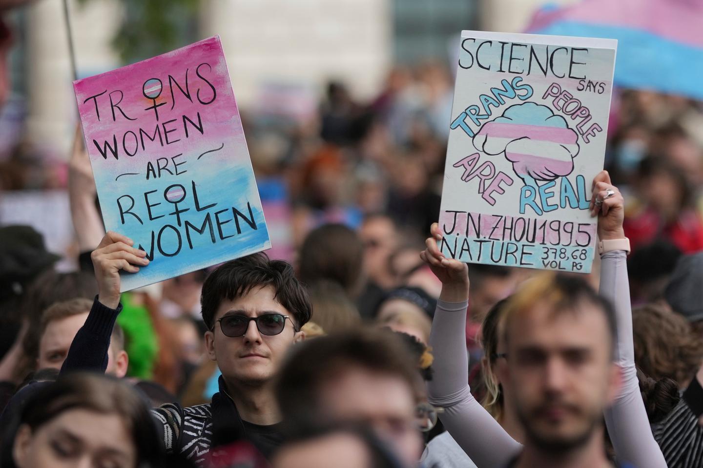 Thousands of trans rights supporters gather in London following UK ruling over definition of woman