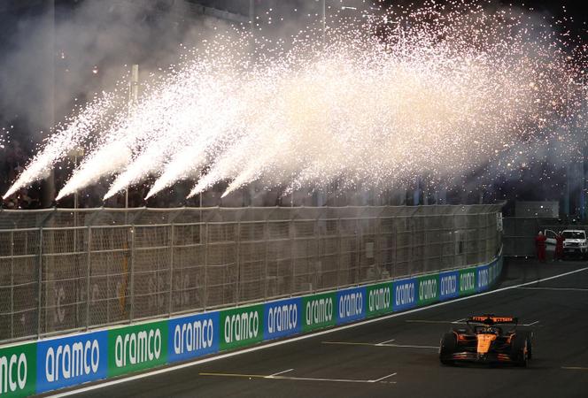 Oscar Piastri de McLaren passes fireworks after winning the Grandbia Saudi Grand Prix, in Jeddah, Saudi Arabia, April 20, 2025