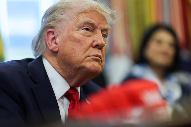 The president of the United States, Donald Trump, observes, while signing executive orders at the Oval Office of the White House in Washington, DC, USA, April 23, 2025.