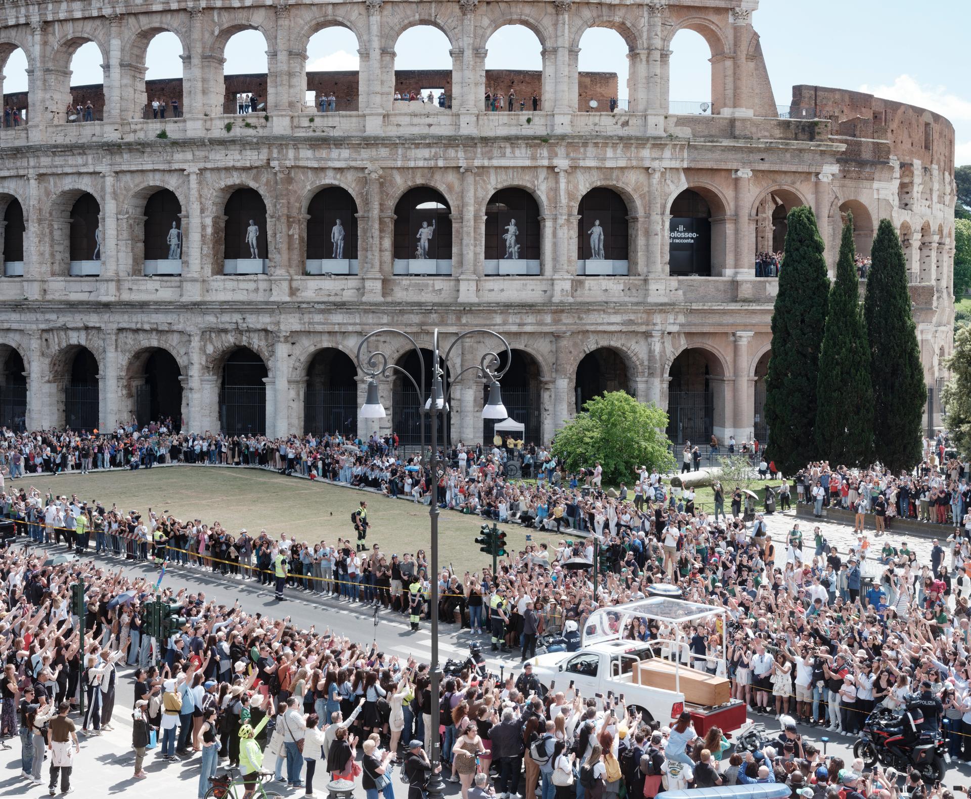 The pope's coffin, transported in the Popemobile, along the Via dei Fori Imperiali, in Rome on April 26, 2025.
