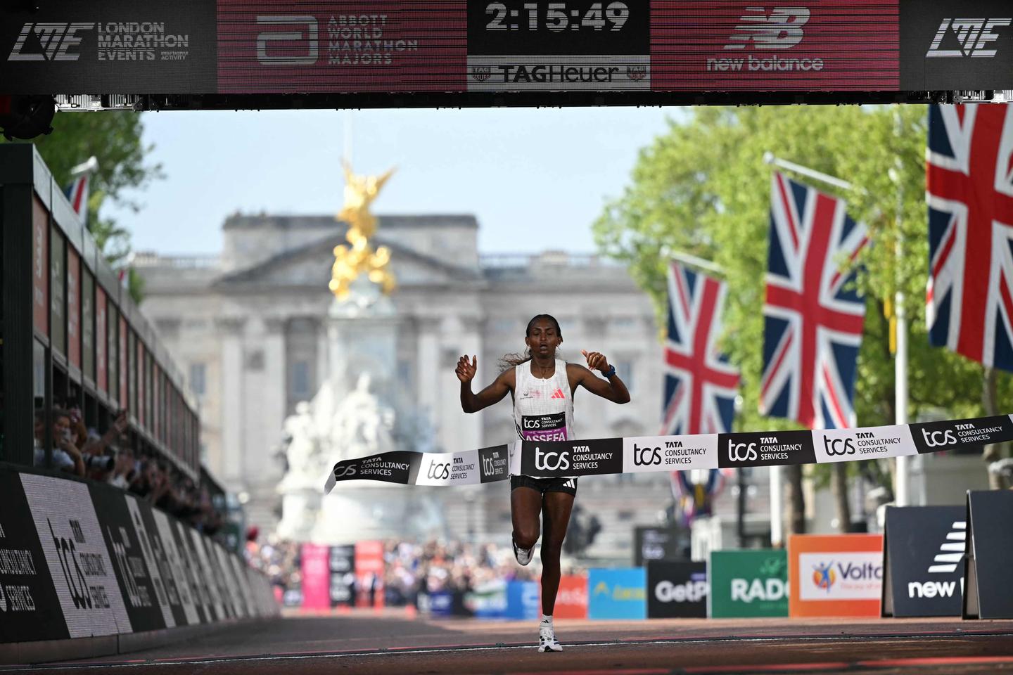 Ethiopia's Tigst Assefa breaks world record to win London marathon