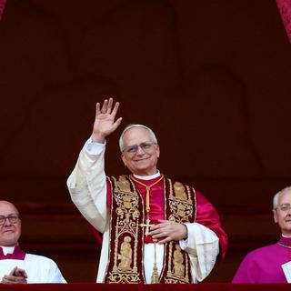 Newly elected Pope Leo XIV, Cardinal Robert Prevost of the United States appears on the balcony of St. Peter's Basilica, at the Vatican, May 8, 2025. REUTERS/Guglielmo Mangiapane