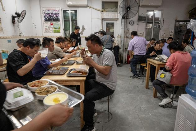During dinner break, a workers' restaurant in Guangzhou, April 15, 2025.