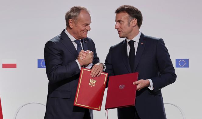 Le premier ministre polonais, Donald Tusk, et le président français, Emmanuel Macron, après la signature d’un traité d’amitié et de coopération renforcée entre les deux pays à la mairie de Nancy, vendredi 9 mai 2025.